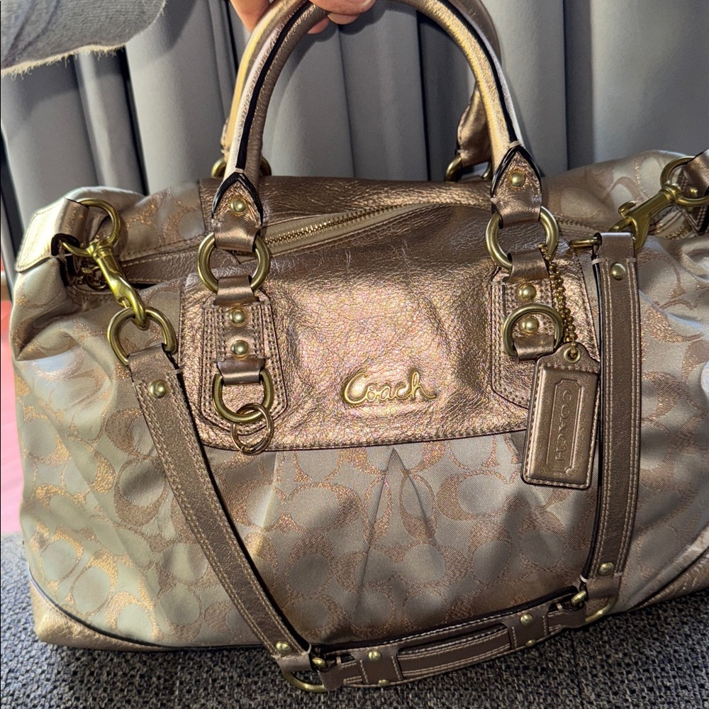 Coach like new Gold Satchel shimmering  handbag, shoulder bag with toy